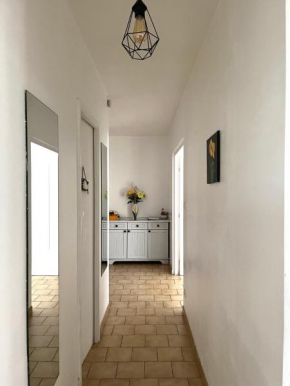 Appartement de 80m2 aux portes de Lyon avec ascenseur, balcon, parking